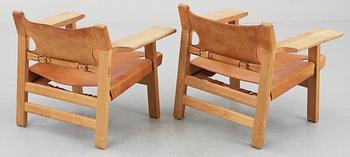 A pair of Børge Mogensen 'The Spanish Chair' in oak and leather by Fredericia Stolefabrik, Denmark.