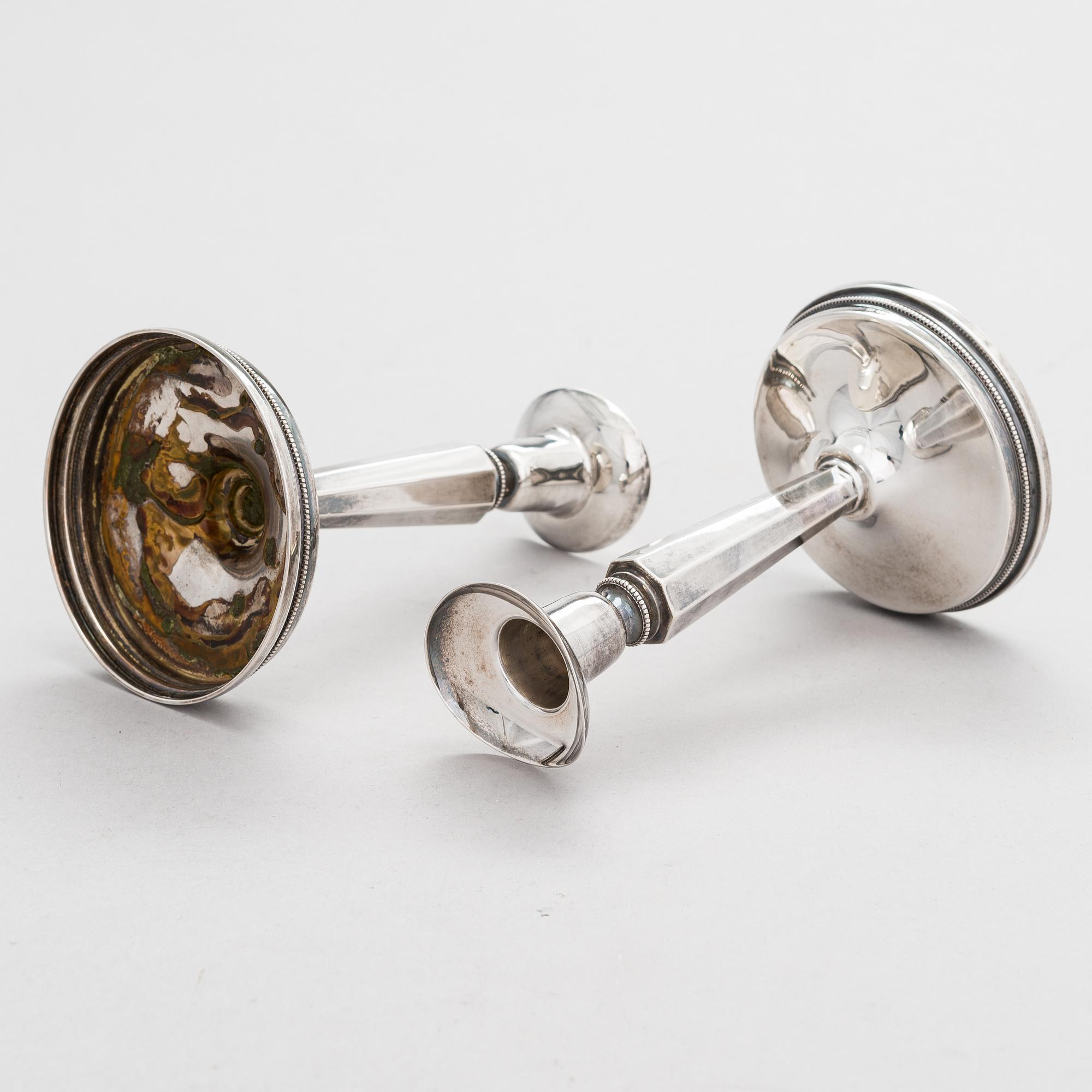 Malja, hopeaa, Ingrid Råström, ja kynttilänjalkapari, hopeaa, Ruotsi 1985 ja 1959.