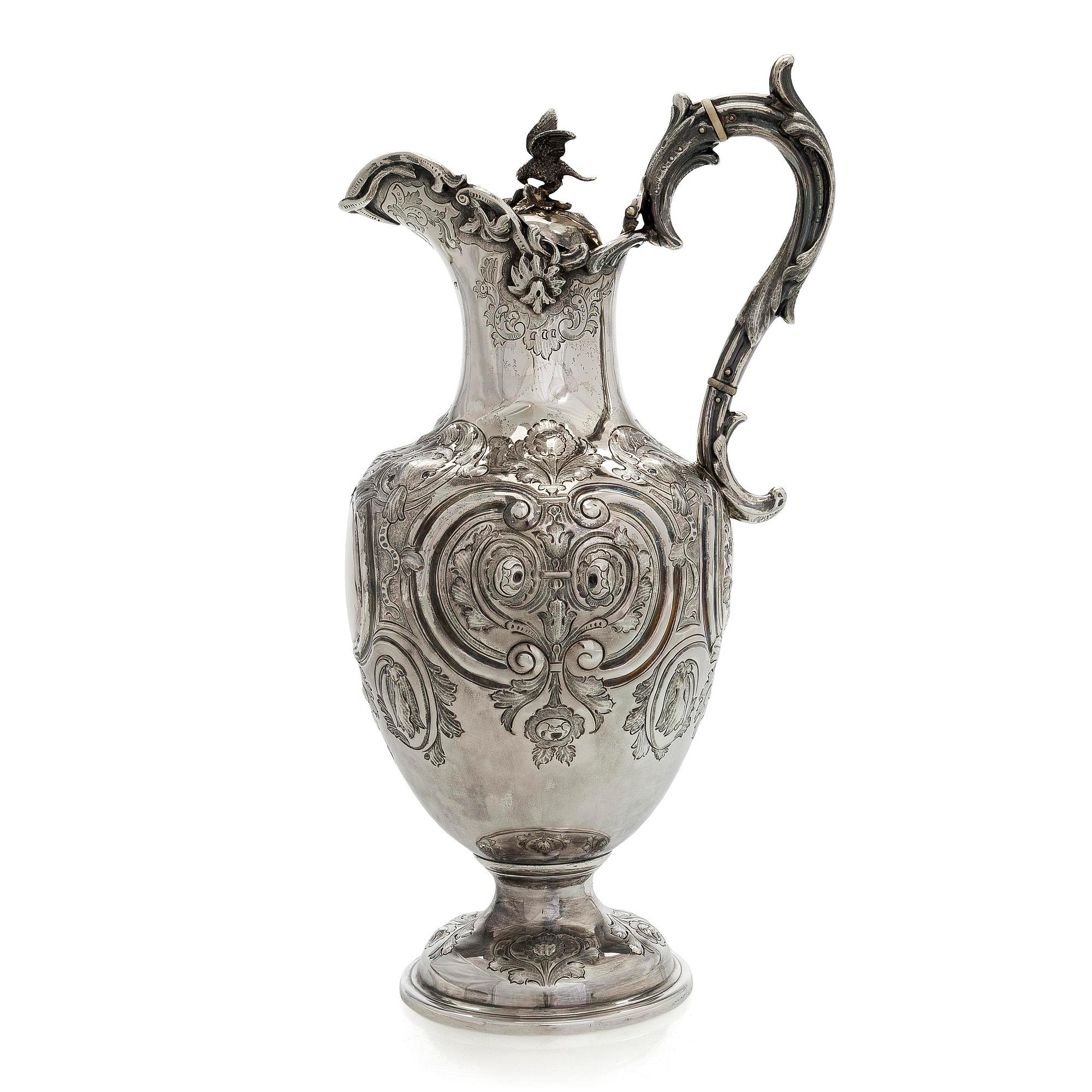 A sterling silver jug, maker's mark of Martin, Hall & Co, Sheffield 1877.