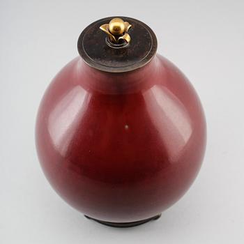 Carl Halier, & Knud Andersen, a stoneware and patinated bronze jar, lid and base, Royal Copenhagen, Denmark 1935.