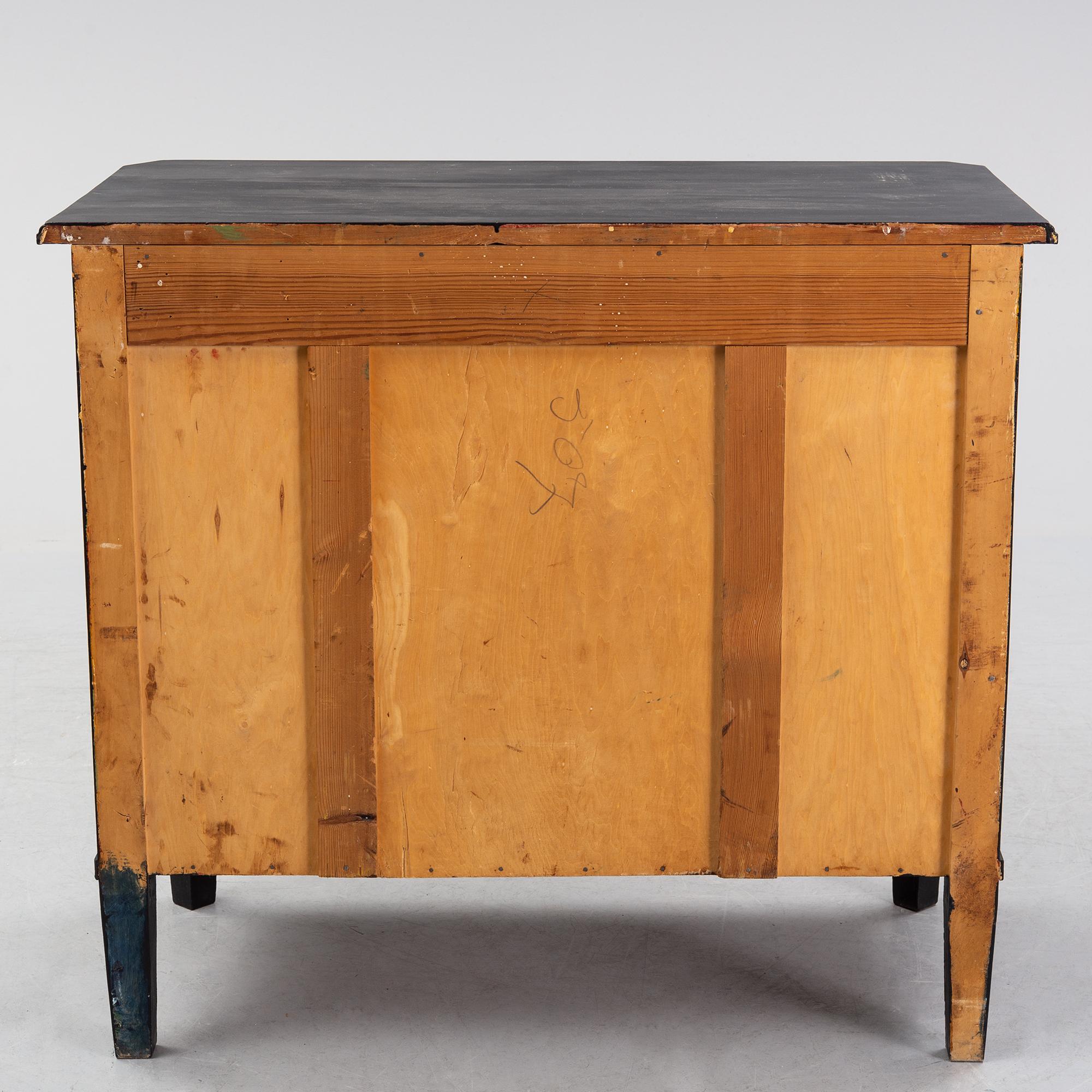 A painted chest of drawers, early 20th Century.