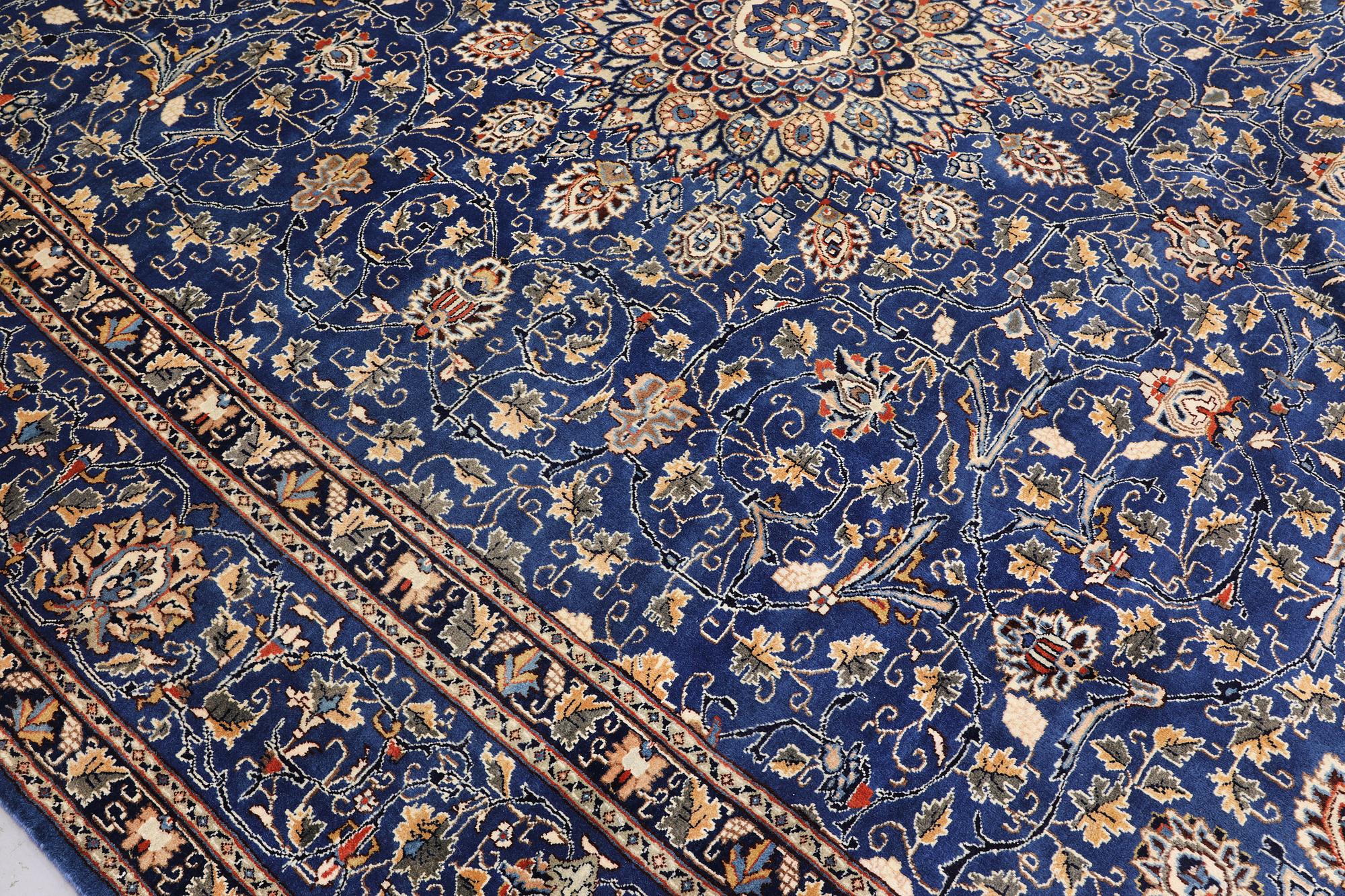 A Kashmar carpet, 408 x 307 cm.