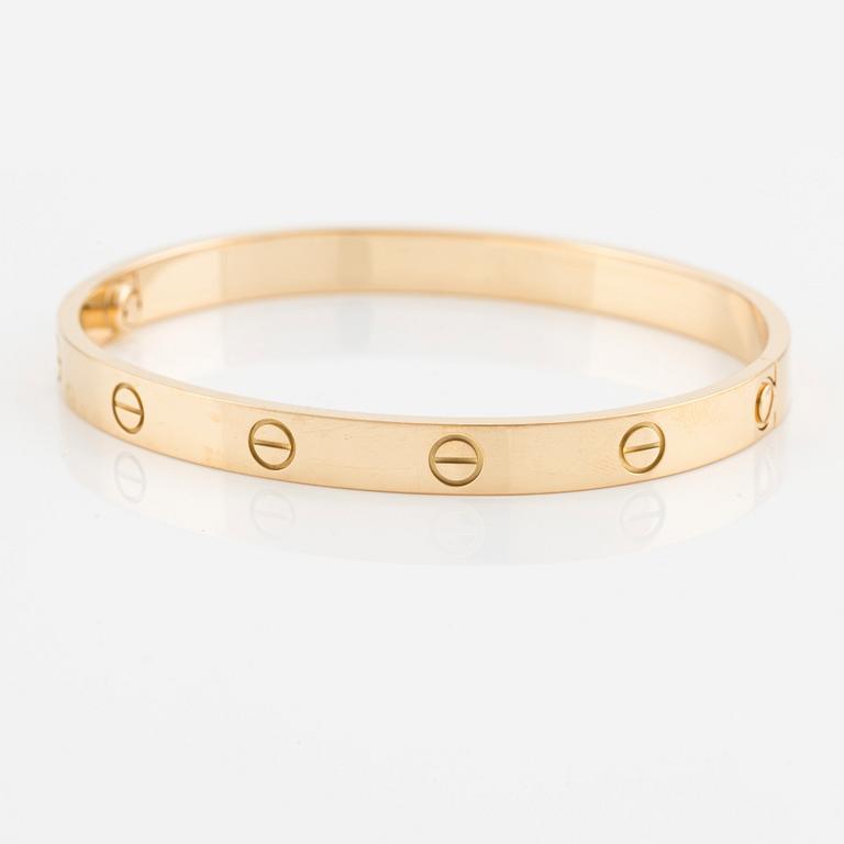 An 18K gold Cartier "Love" bracelet.