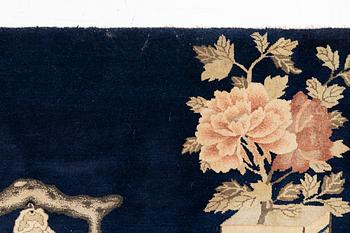 A semi-antique Baotou rug, approx. 185 x 122 cm.
