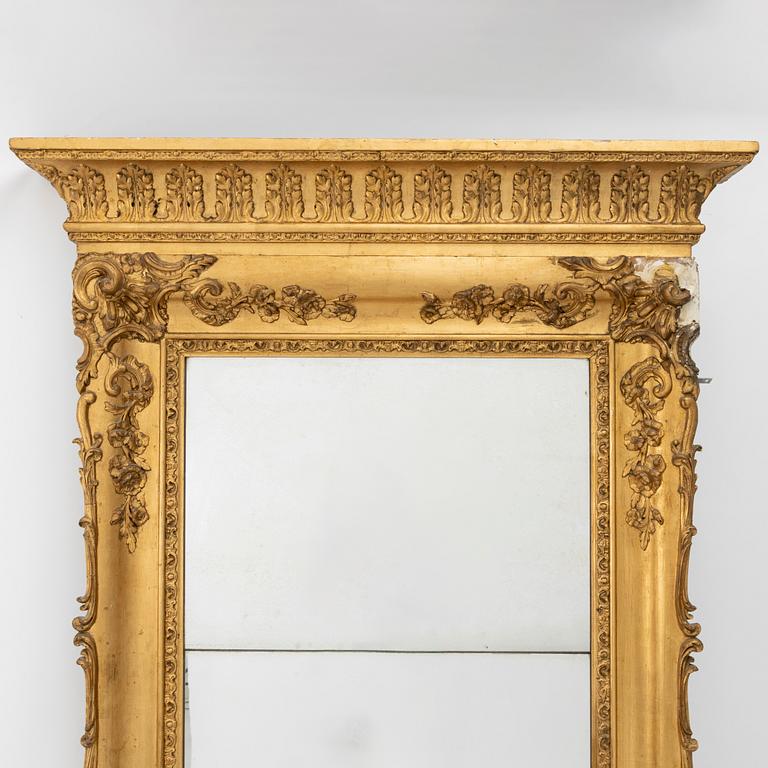 A Rococo style mirror, late 19th Century.