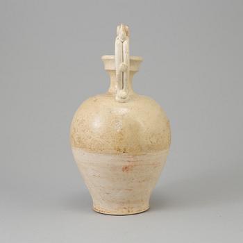 A clay vase with handles, presumably Tang dynasty.