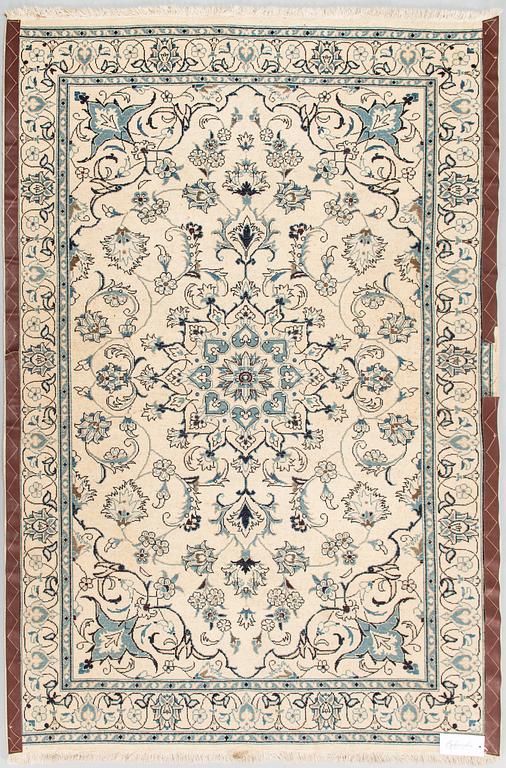 A carpet, Nain Part Silk. Ca 185 x 123 cm.