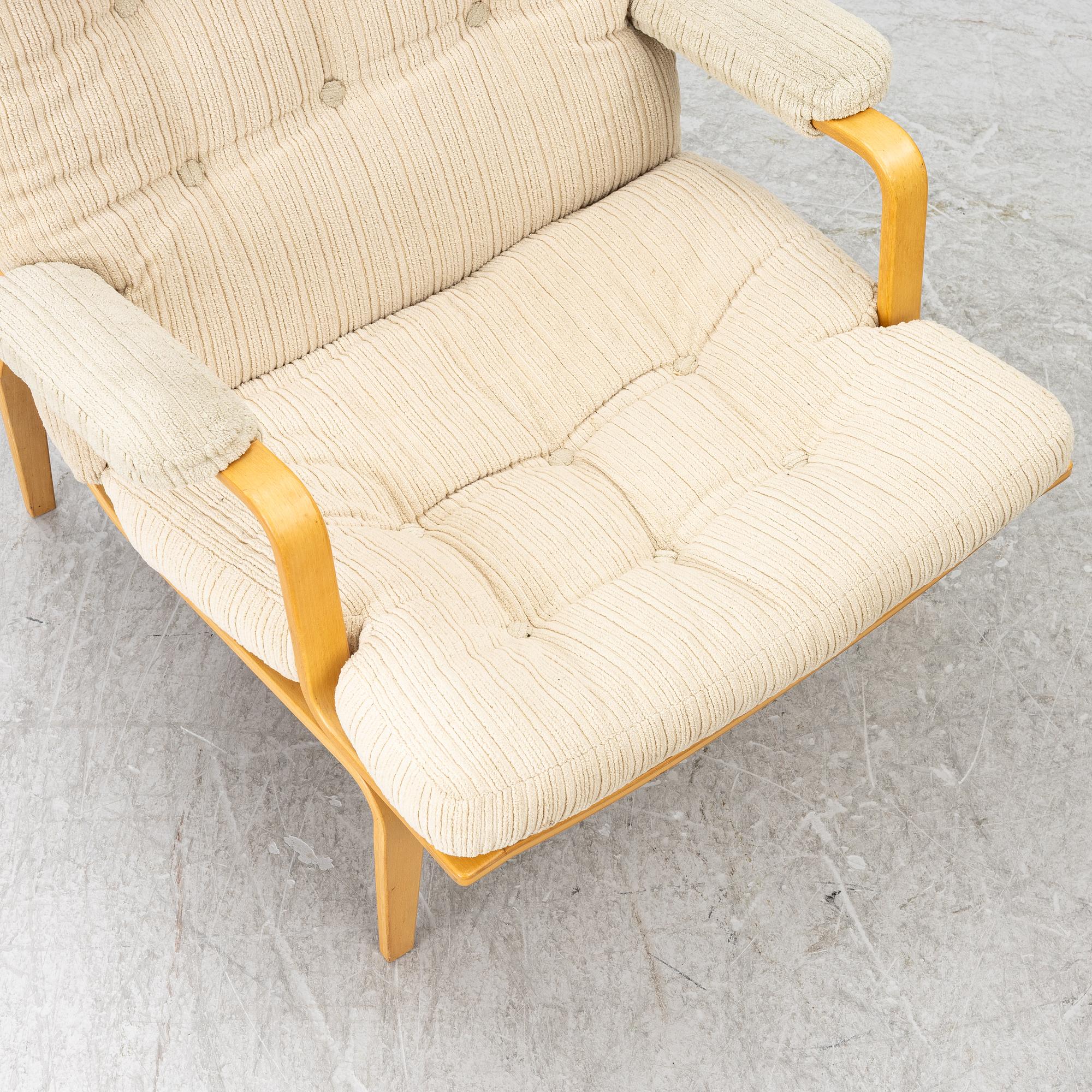 Bruno Mathsson, Armchair with footstool, “Ingrid”, Dux.