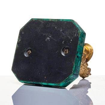 A Russian Nicholas II malachite-veneered and gilt-bronze candlestick, late 19th century.