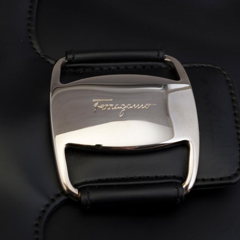 SALVATORE FERRAGAMO, a leather handbag.