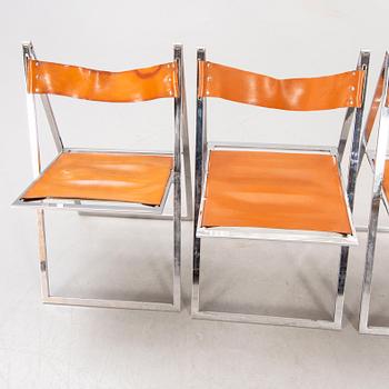 A set f four Fontoni & Geraci leather and chrome folding chairs