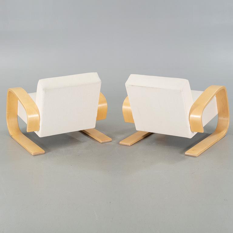 A pair of model 400 "Tank" chair designed by Alvar Aalto, Artek, 2004.