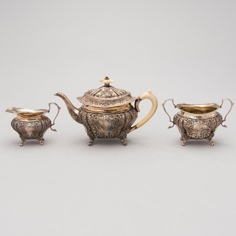 A three piece silver tea set, Albert Henry Thompson, Sheffield, England, 1896.