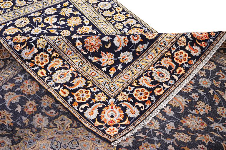 A Kashan carpet, c. 335 x 224 cm.