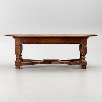 An oak dining table, Baroque early 18th century and Baroque style 19th/20th century.