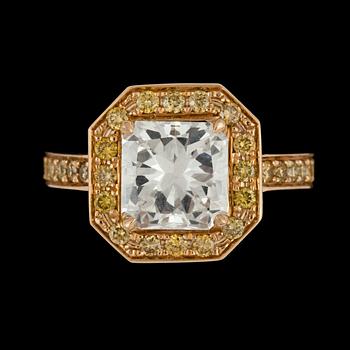 105. A radiant cut diamond, 2.12 cts, and small yellow diamonds total carat weight circa 0.50 ct.