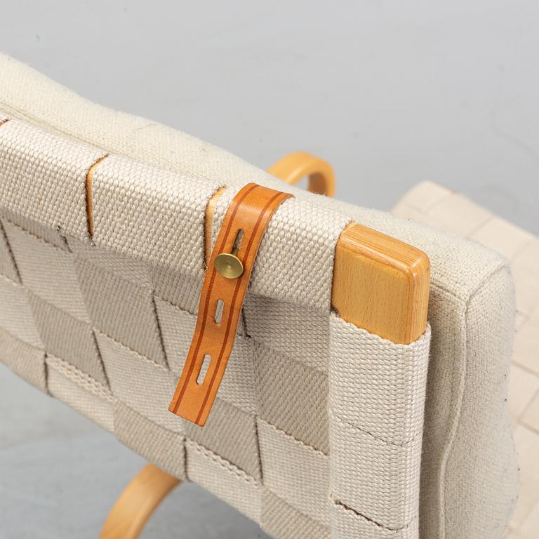 A Miranda lounge chair by Bruno Mathsson, dated 2001.