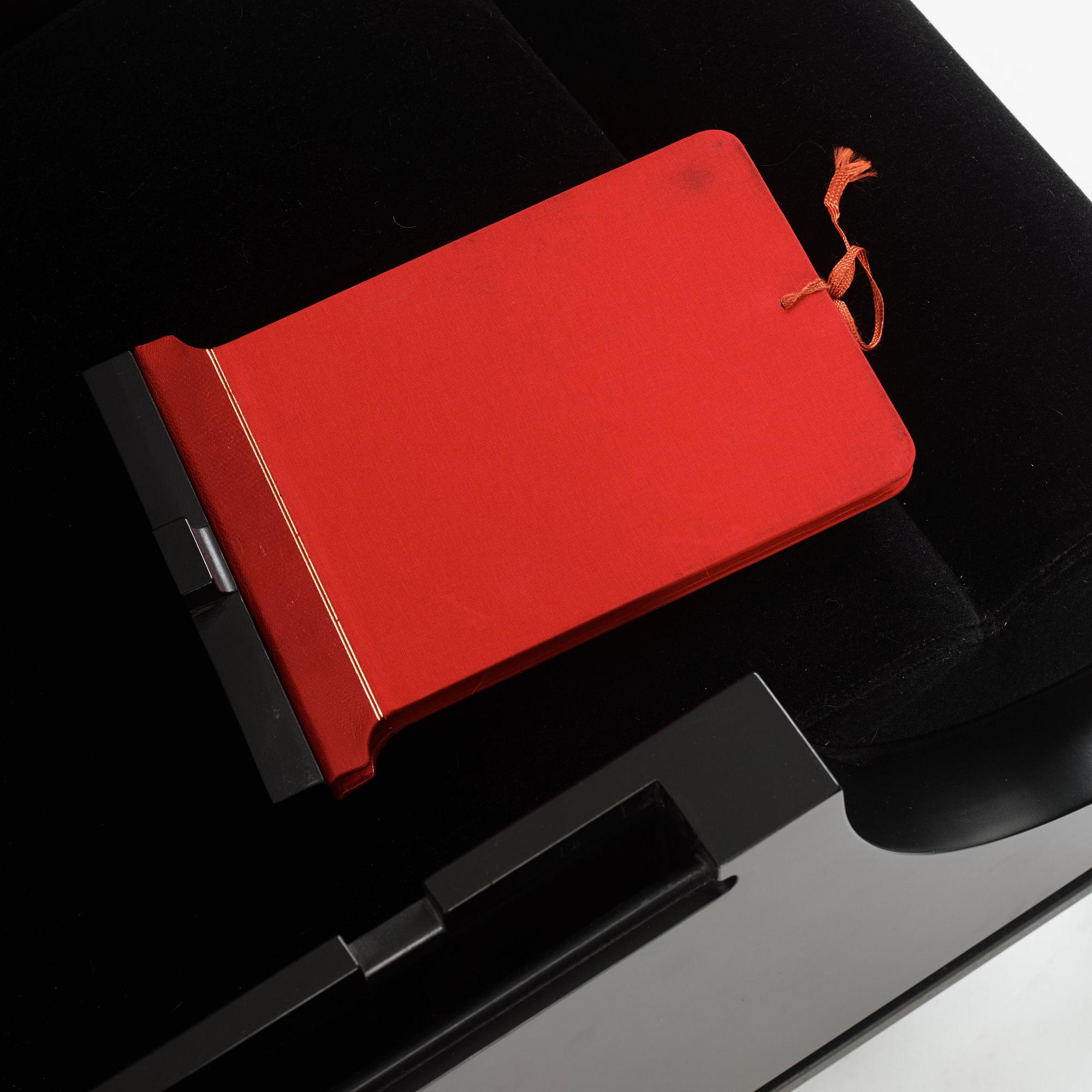 Alexander H Damsbo & Henrik Ingemann Nielsen, a "HC-Andersen Chair" armchair/table, ed. 3/49, Källemo, post 2005.