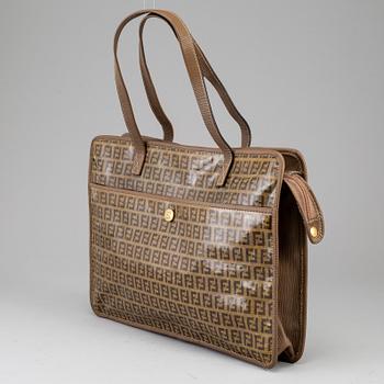FENDI, a textile handbag.