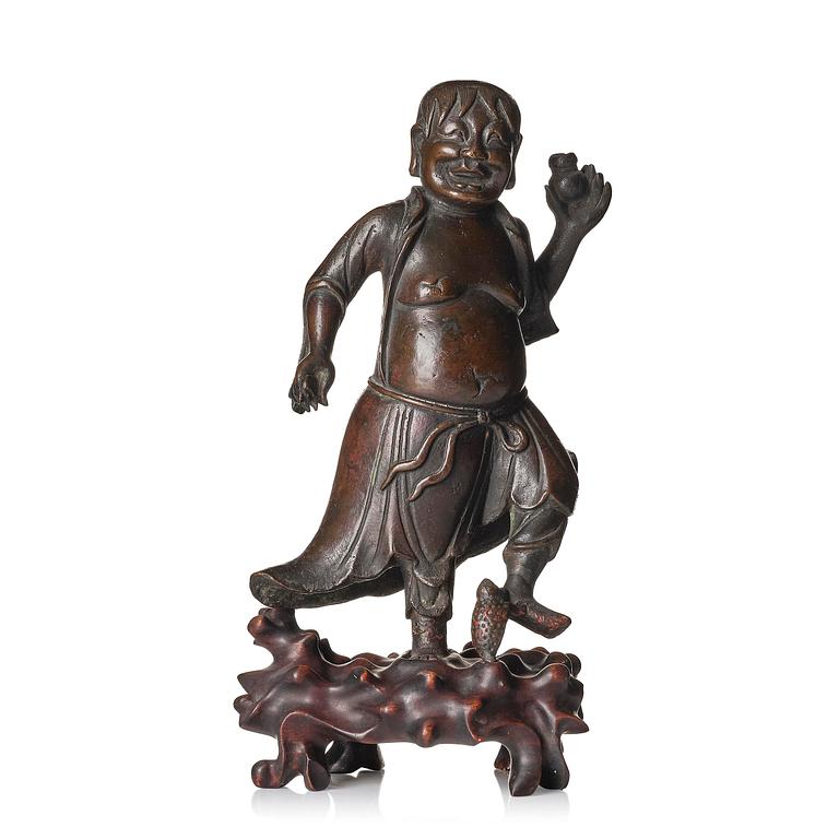 A bronze sculpture of Liu Hai, Qing dynasty, 19th century.