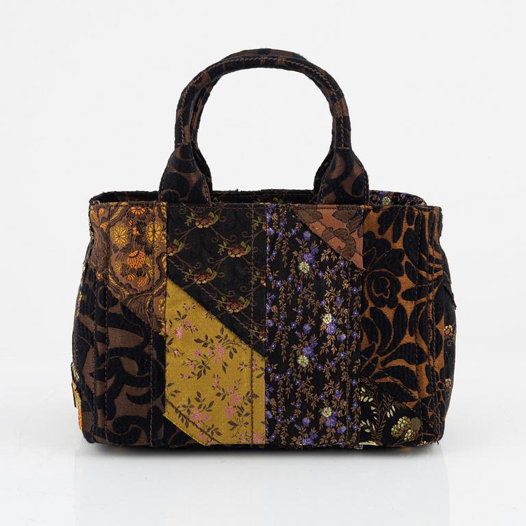 Prada, a embroidered silk 'Broccato patch' bag.