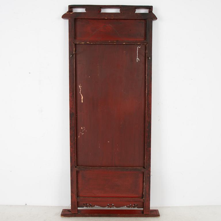 A lacquered mirror, Qing dynasty, 19th century.