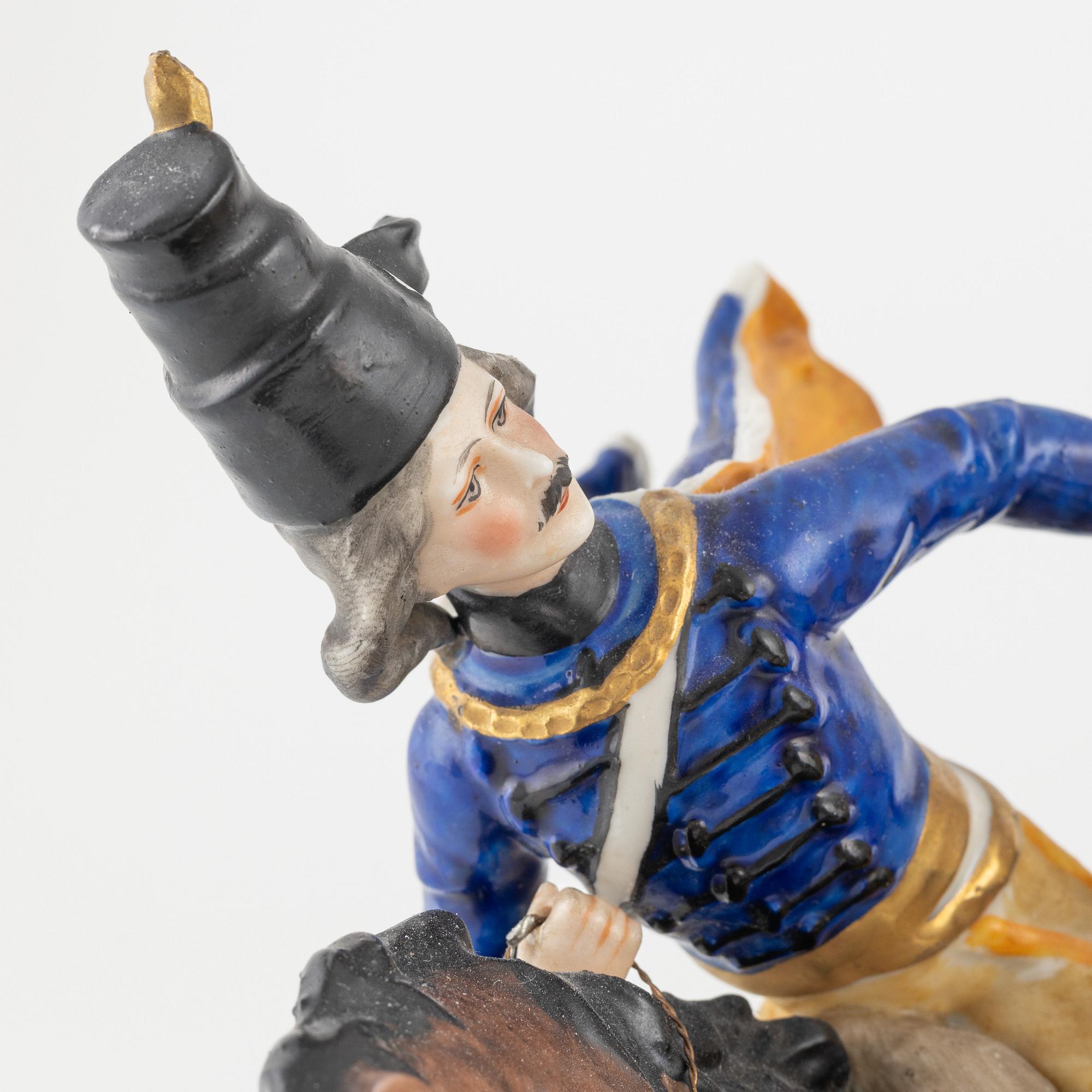 A porcelain figurine group, "Naples like mark", first half of the 20th Century.