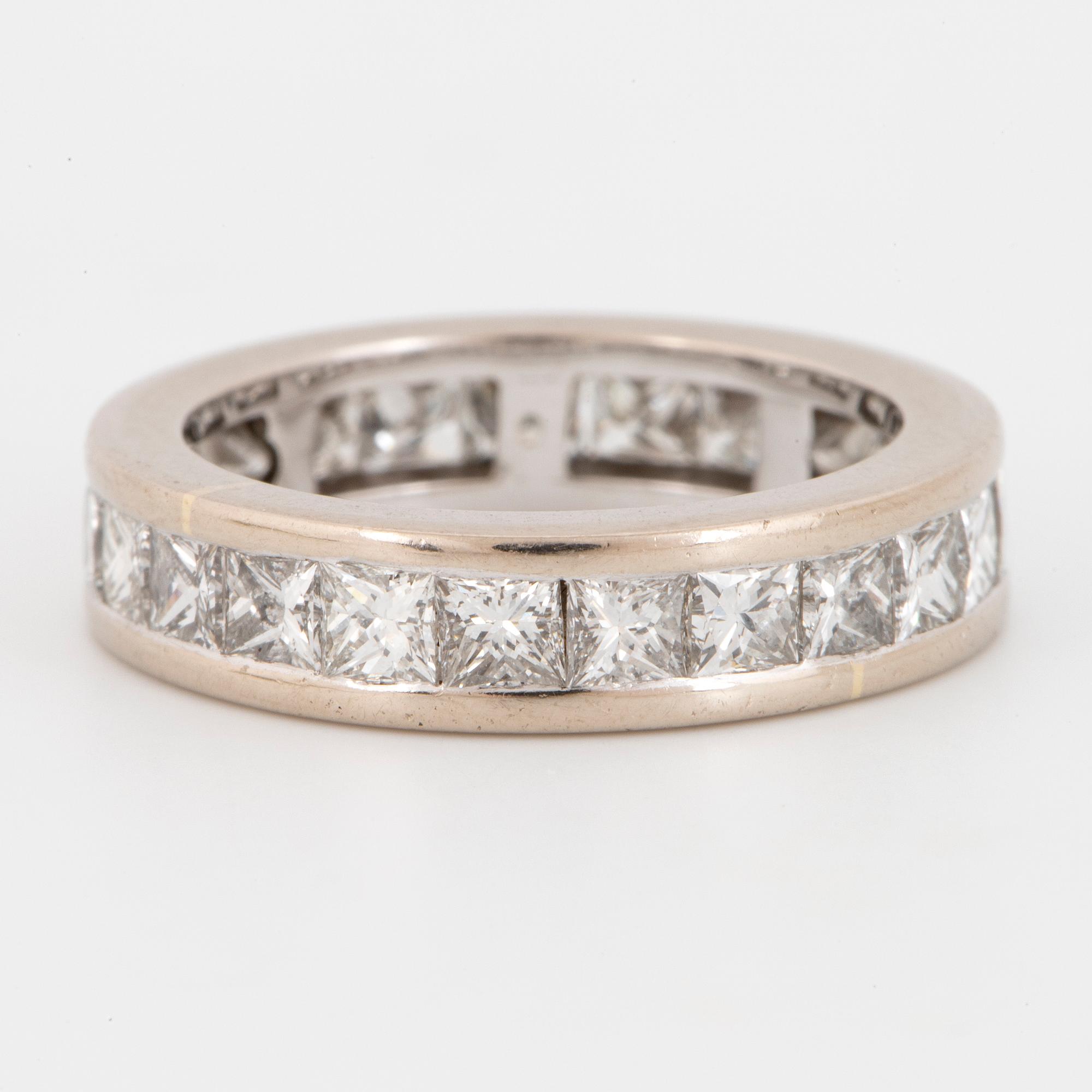 Princess-cut diamond eternity ring.