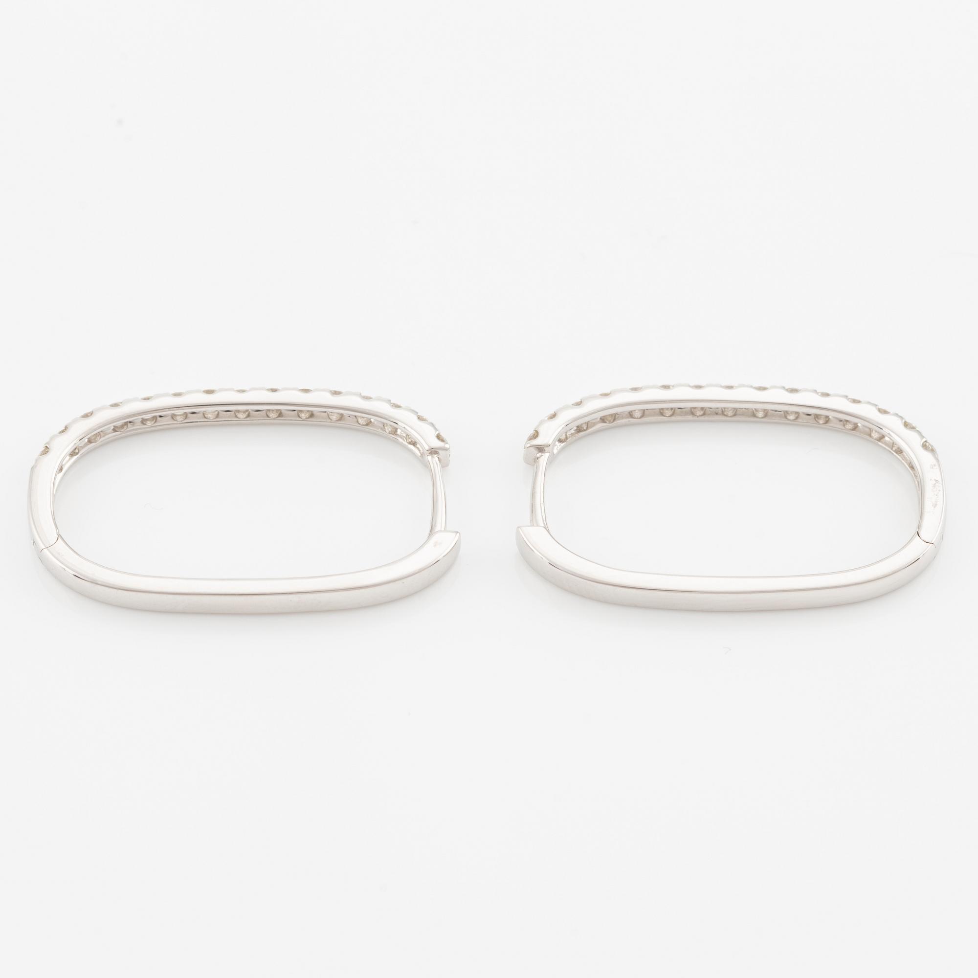 Earrings with brilliant-cut diamonds.