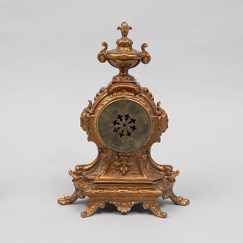 A Louis XVI-style mantel clock, circa 1900.