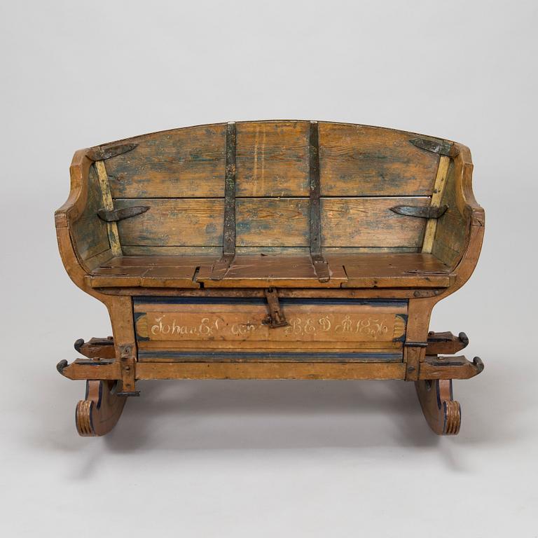 A 19th-century wooden sleigh.