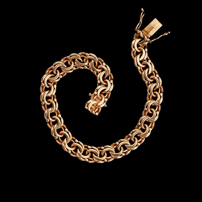 ARMBAND, 18 k guld, 1966. Vikt ca 24 g.