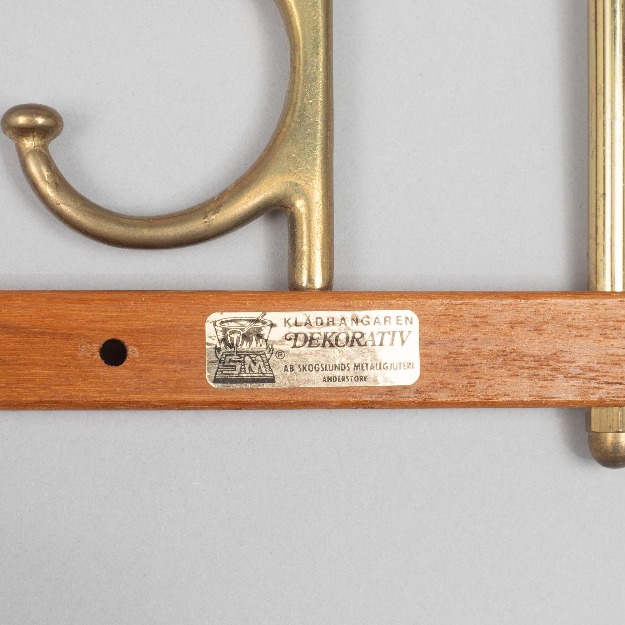 A pair of 'Dekorativ' coat hangers, Skoglunds metallgjuteri, Anderstorp, 1950's/60's.