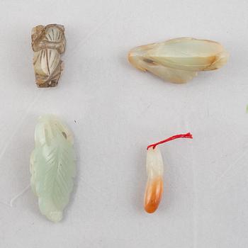 A group of eight Chinese stone charms, 20th century.