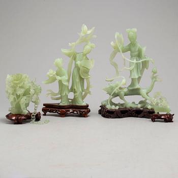 Four Chinese glass sculptures, 20th century.