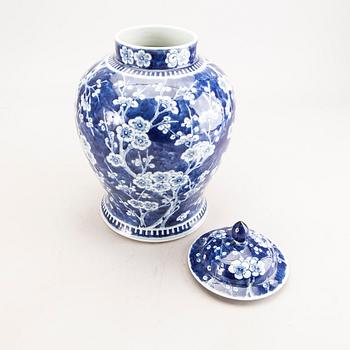 A Chinese 20th century porcelain blue and white urn with lid.