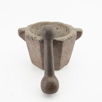 A Swddish 18th/19th century limestone and cast iron mortar.