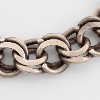 Silver bracelet.