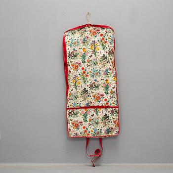 GUCCI, a 'Flora' garment bag.