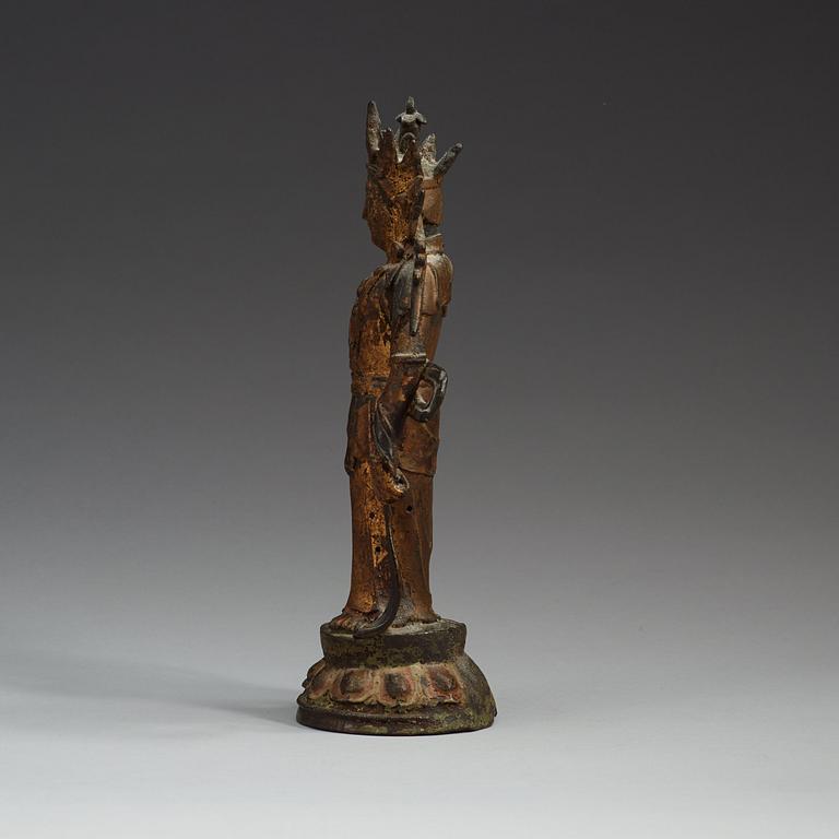 A gilt bronze figure of a standing Maitreya Bodhisattva, Ming dynasty (1368-1644).