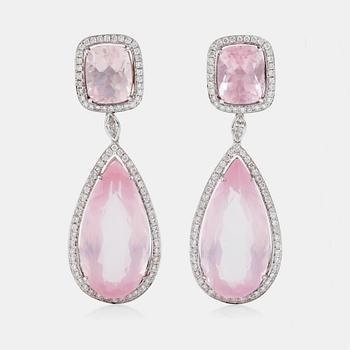 673. A pair of rose quartz, circa 34.00 ct, and diamond, circa 1.32 ct, earrings.