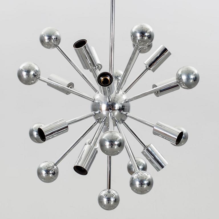 A Paul de Haan Sputnik pendant.