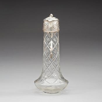 A Swedish 20th century parcel-gilt and cut glass decanter, marks of W.A. Bolin, Stockholm possibly 1918.