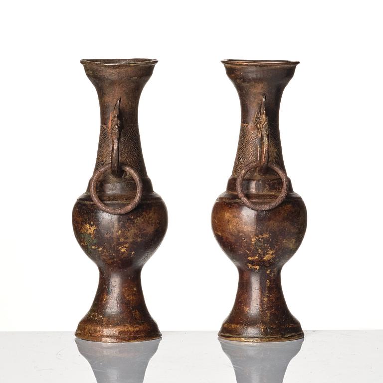 A pair of bronze altar vases, Ming dynasty (1368-1644).