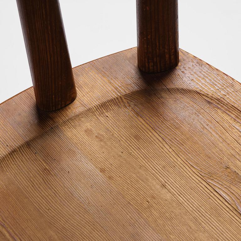 Axel Einar Hjorth, a set of three stained pine "Utö" chairs, Nordiska Kompaniet, Sweden, 1930s.