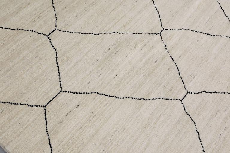 A Moroccan rug, approx. 197 x 149 cm.