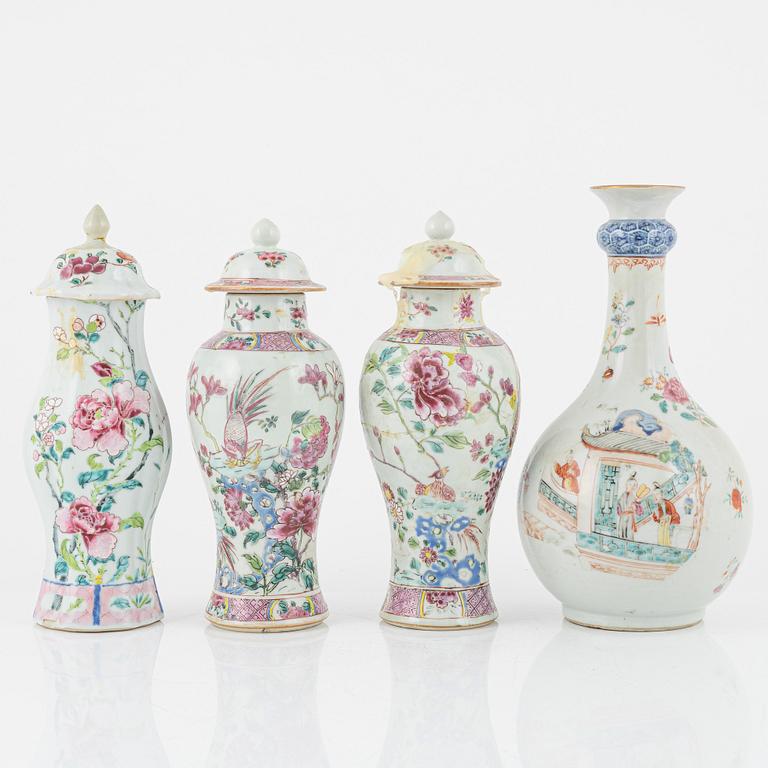 A set of three famille rose vases with covers and a bottle, Qing dynasty, Qianlong (1736-95).