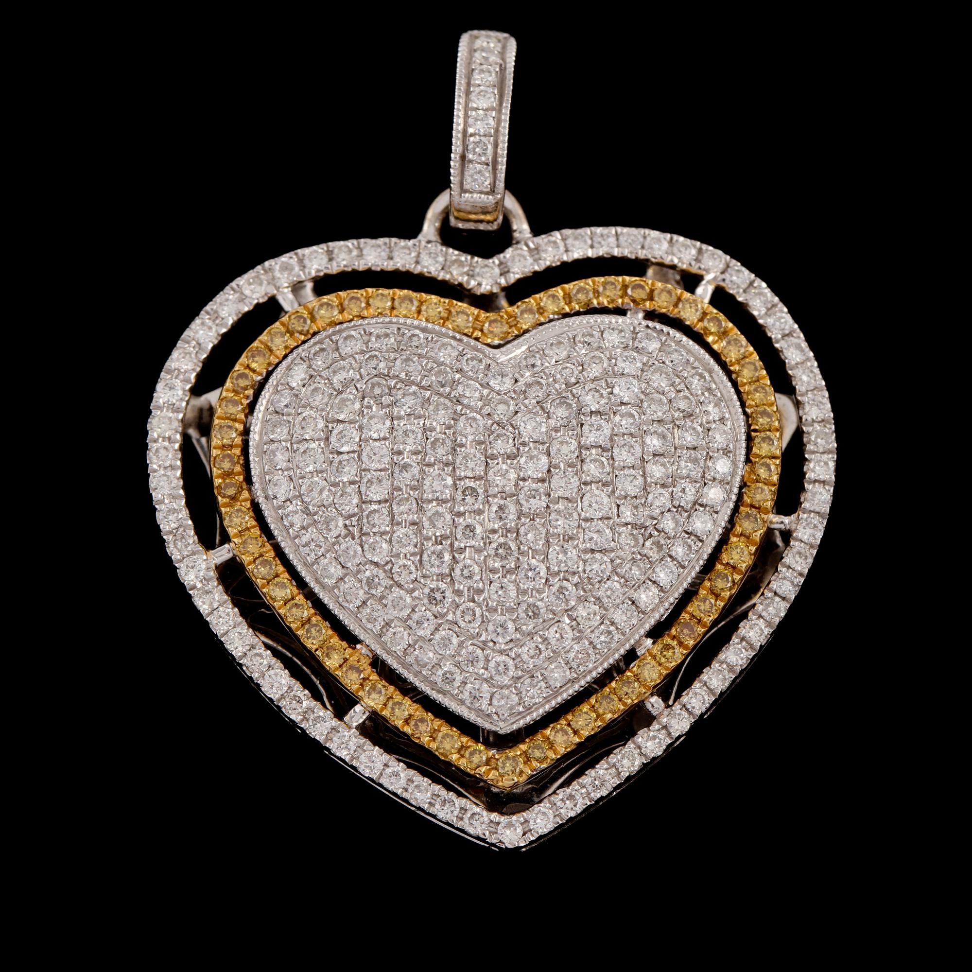 HÄNGE, 18k vitguld med briljantslipade vita och gula diamanter, totalt 1.50 ct. Vikt 6 g.