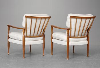 A pair of Josef Frank mahogany easy chairs, Firma Svenskt Tenn.