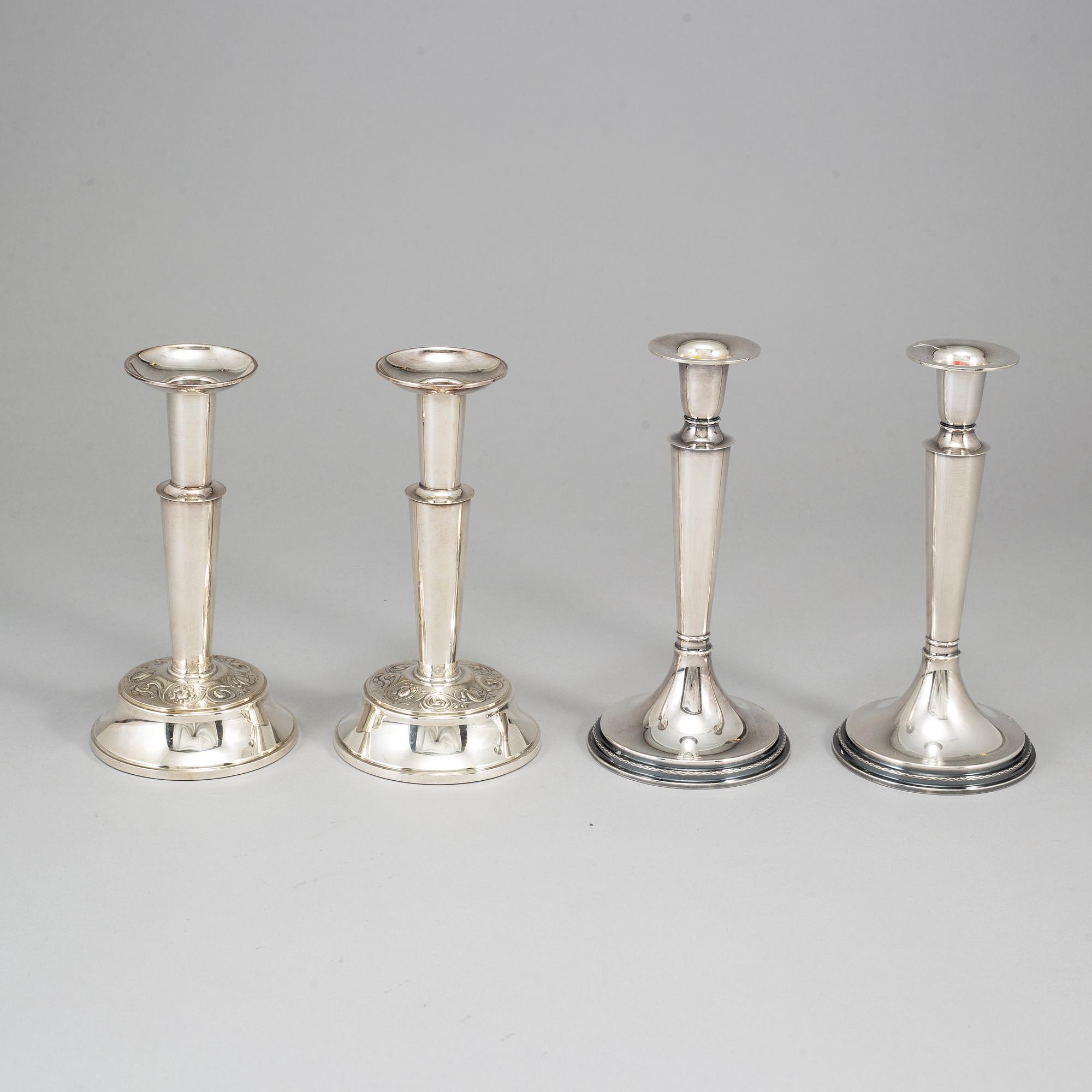Four silver candlesticks from TESI, Gothenburg, 1972-74.
